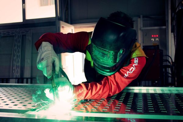 Welder welding an aluminium frame