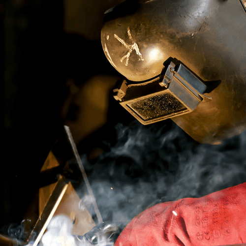 Welding helmet with smoke during welding